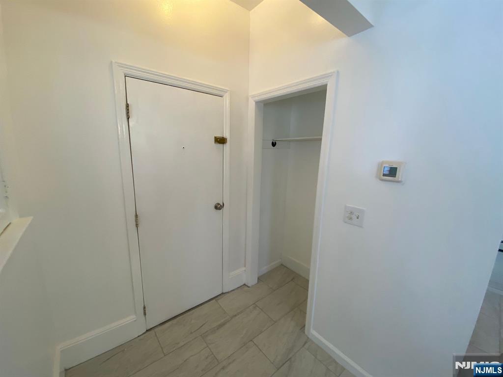 29 High Street, Unit 1R West Orange, NJ 07052 - Photo 7 of 19 a view of a bathroom with shower