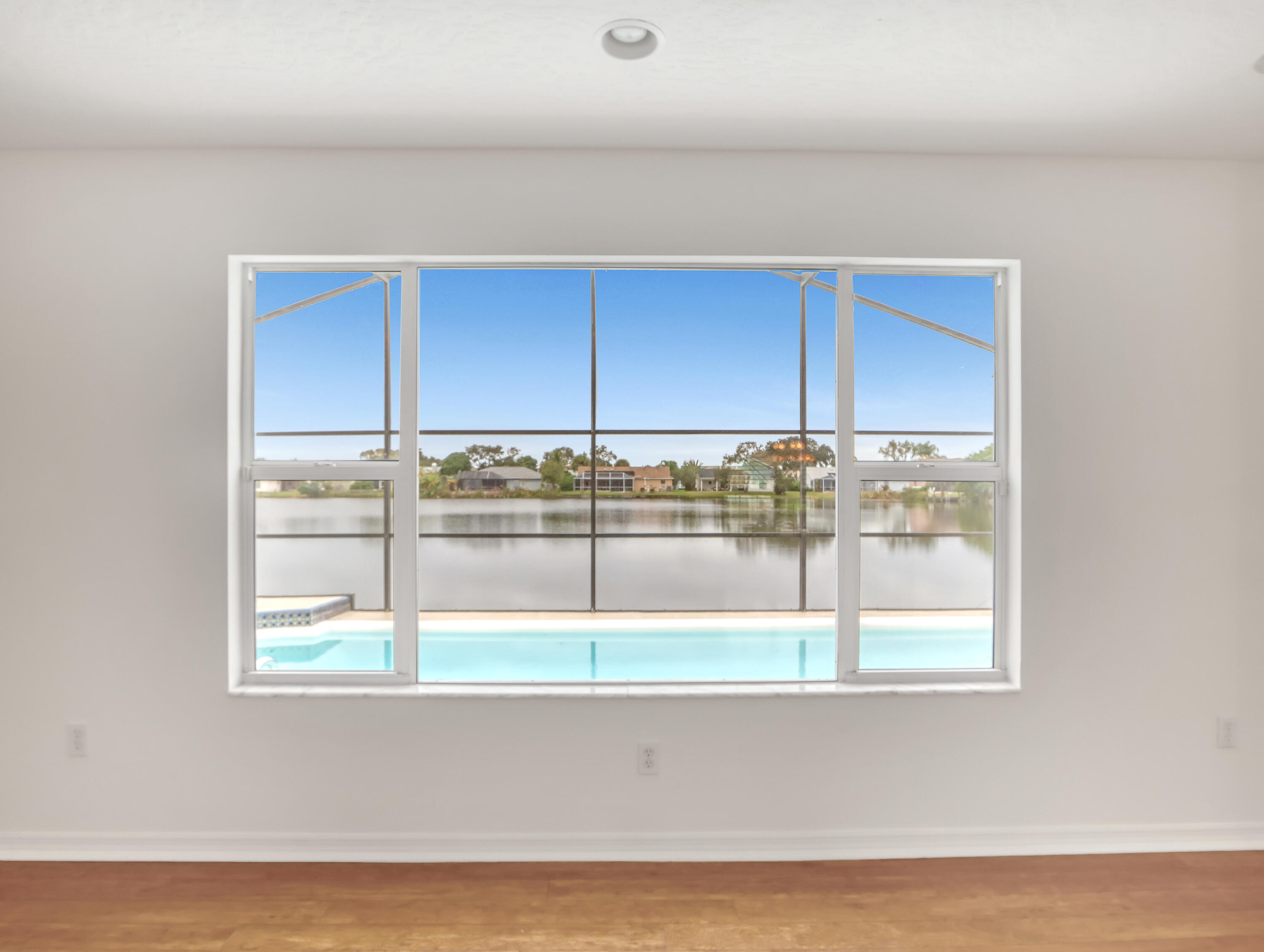 920 Turtle Pond Way Melbourne, FL 32940 - Photo 16 of 53 Large Window Overlooking Lake and Pool