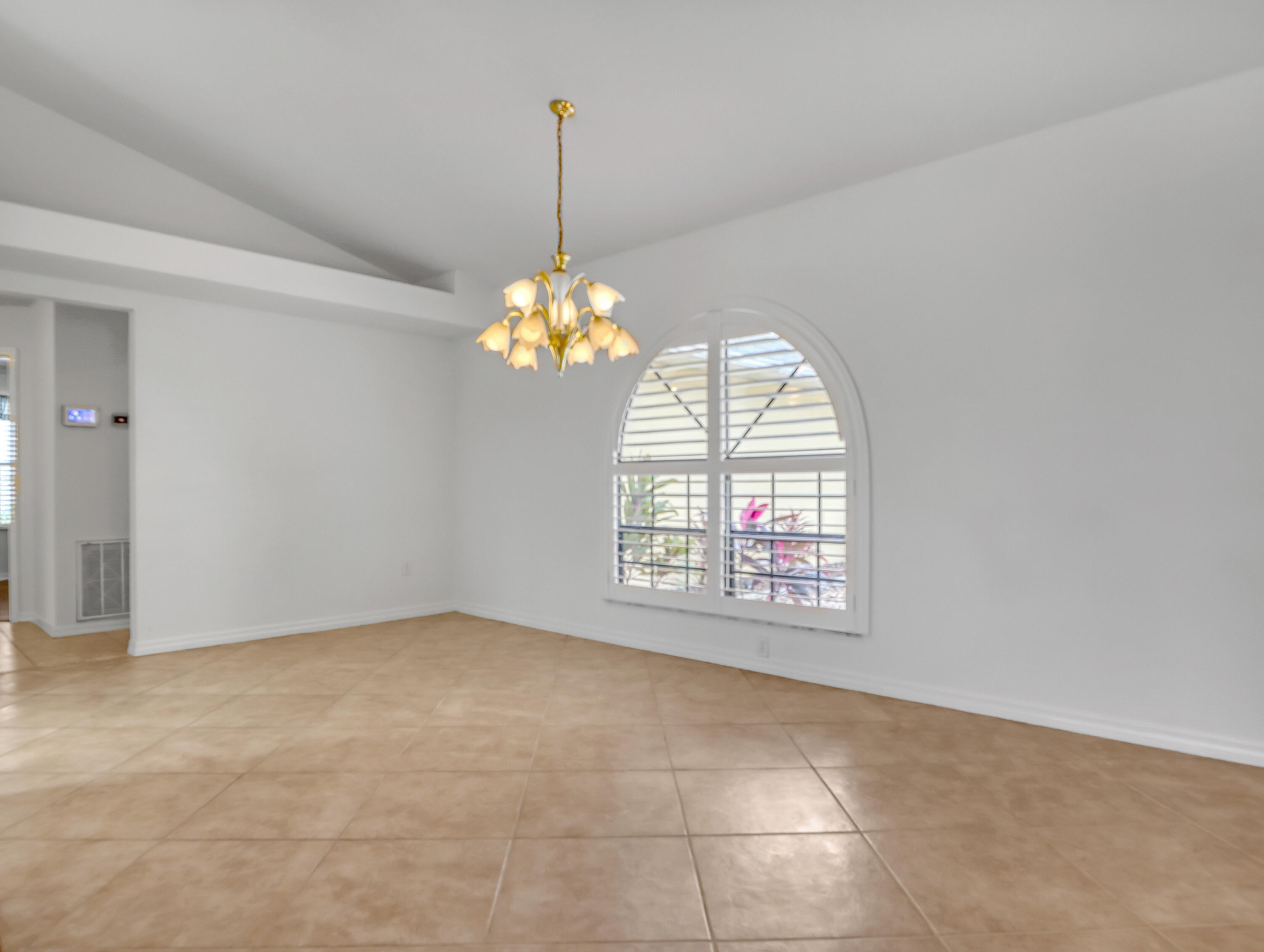 920 Turtle Pond Way Melbourne, FL 32940 - Photo 21 of 53 a view of an empty room with a window