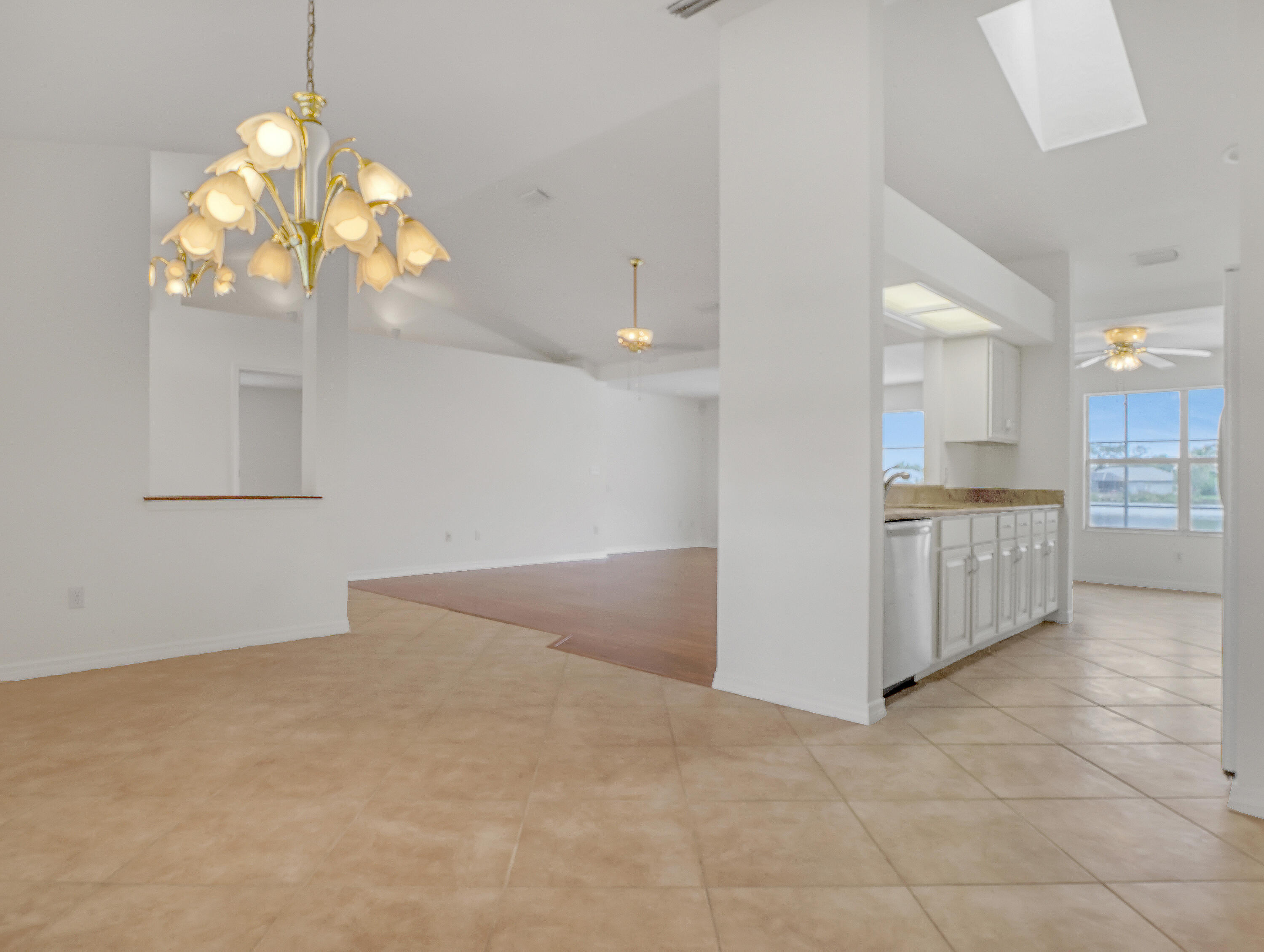 920 Turtle Pond Way Melbourne, FL 32940 - Photo 22 of 53 a view of a kitchen with a sink and chandelier