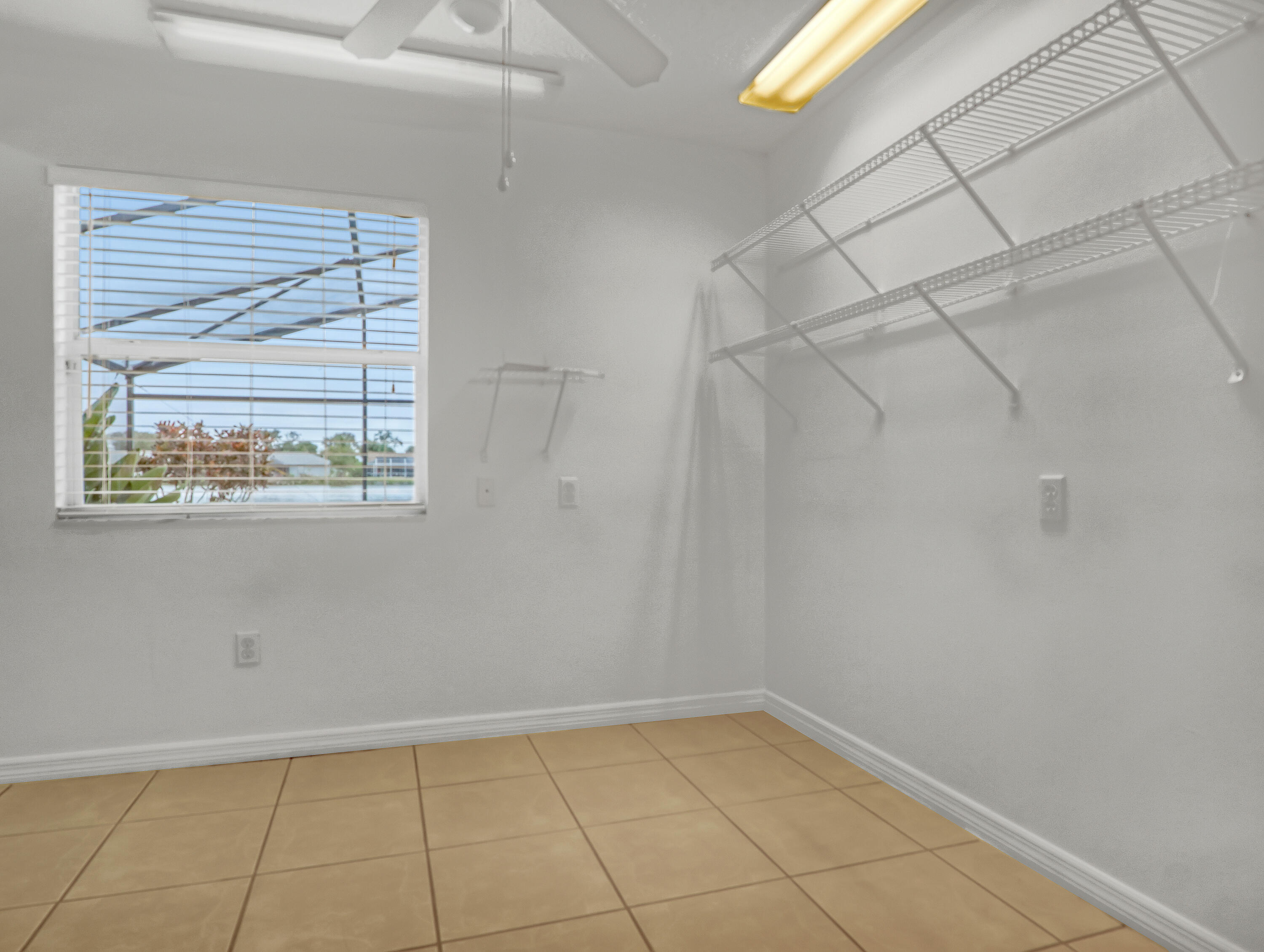 920 Turtle Pond Way Melbourne, FL 32940 - Photo 28 of 53 a view of an empty room with a window