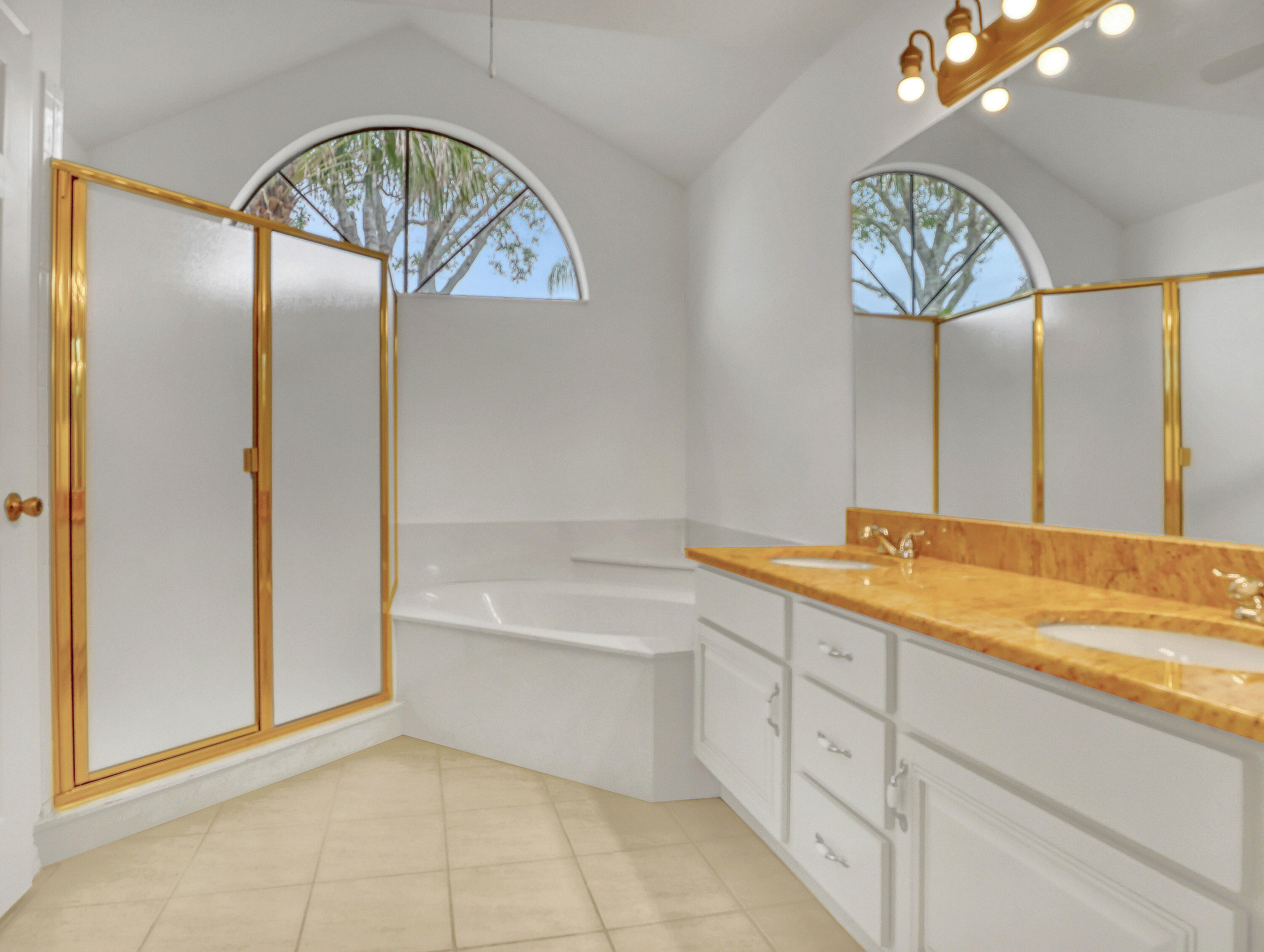 920 Turtle Pond Way Melbourne, FL 32940 - Photo 31 of 53 a spacious bathroom with a tub and a shower