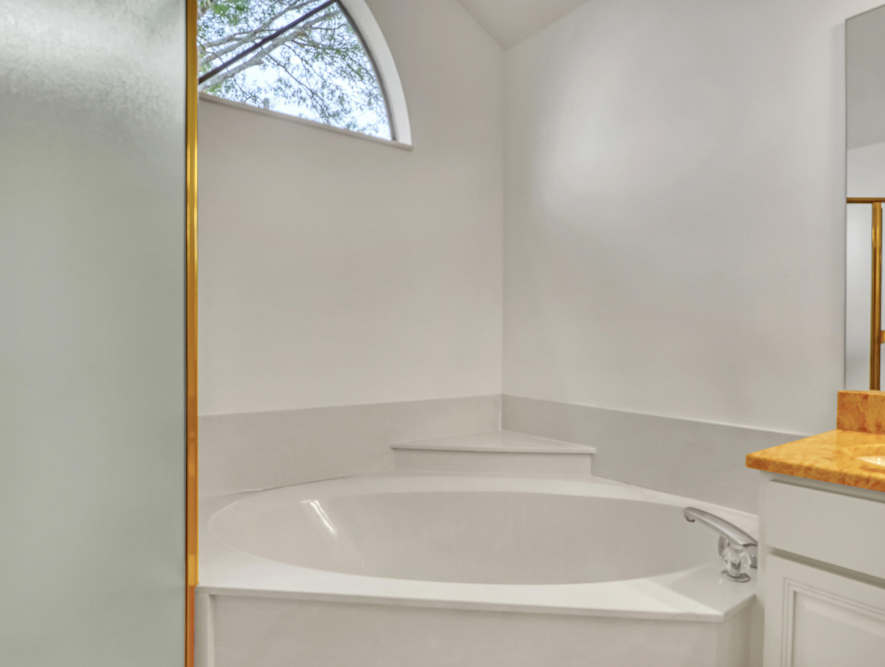 920 Turtle Pond Way Melbourne, FL 32940 - Photo 32 of 53 a white bath tub sitting next to a white sink