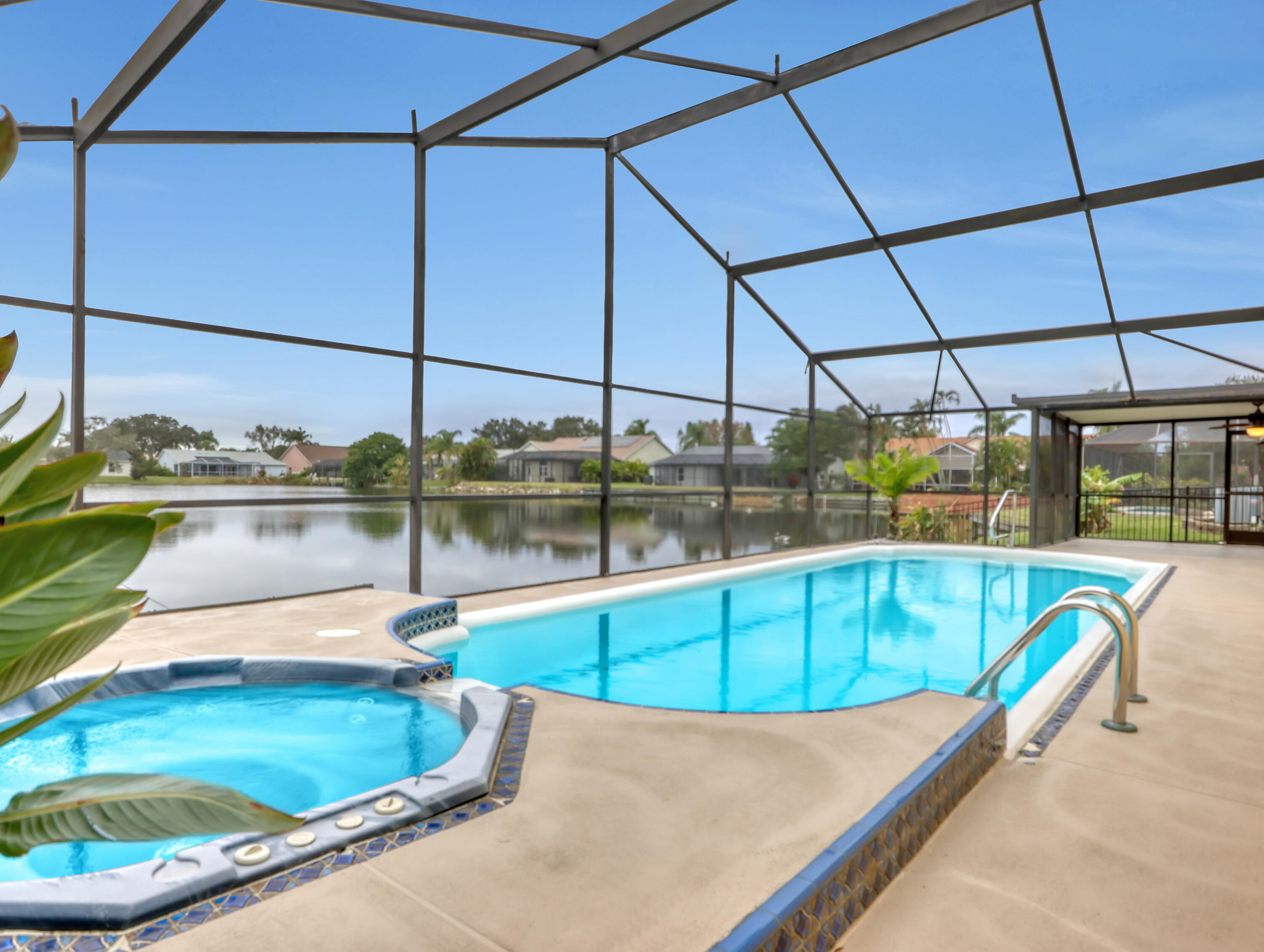 920 Turtle Pond Way Melbourne, FL 32940 - Photo 4 of 53 a view of a swimming pool with a porch