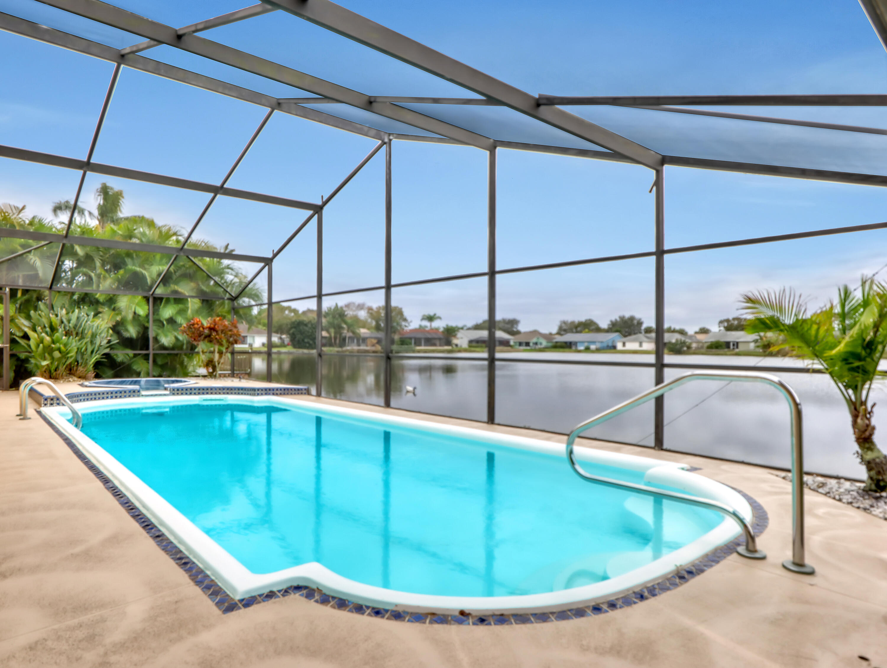 920 Turtle Pond Way Melbourne, FL 32940 - Photo 44 of 53 a view of a swimming pool with a chair