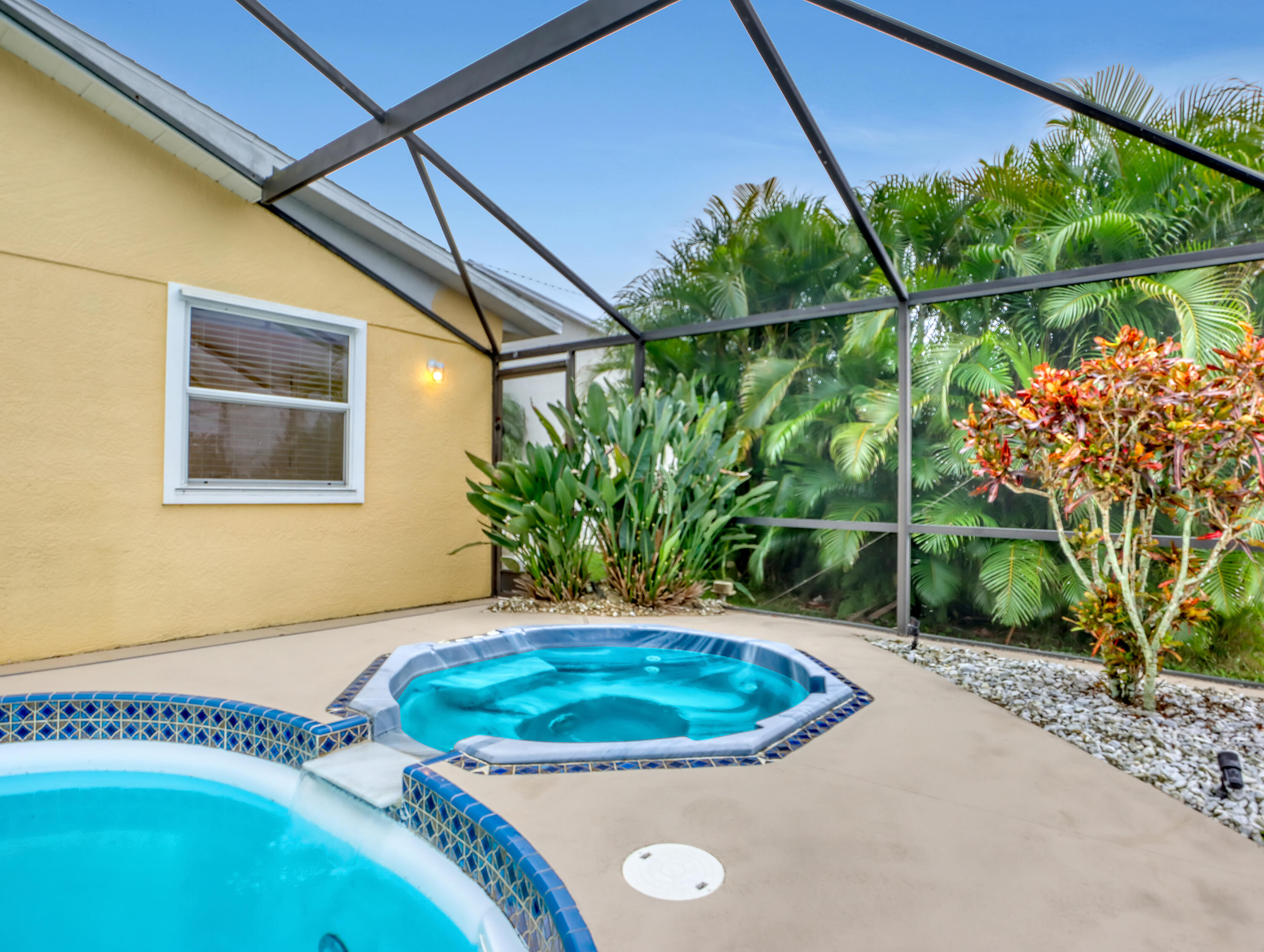 920 Turtle Pond Way Melbourne, FL 32940 - Photo 46 of 53 a view of a swimming pool with a patio and plants