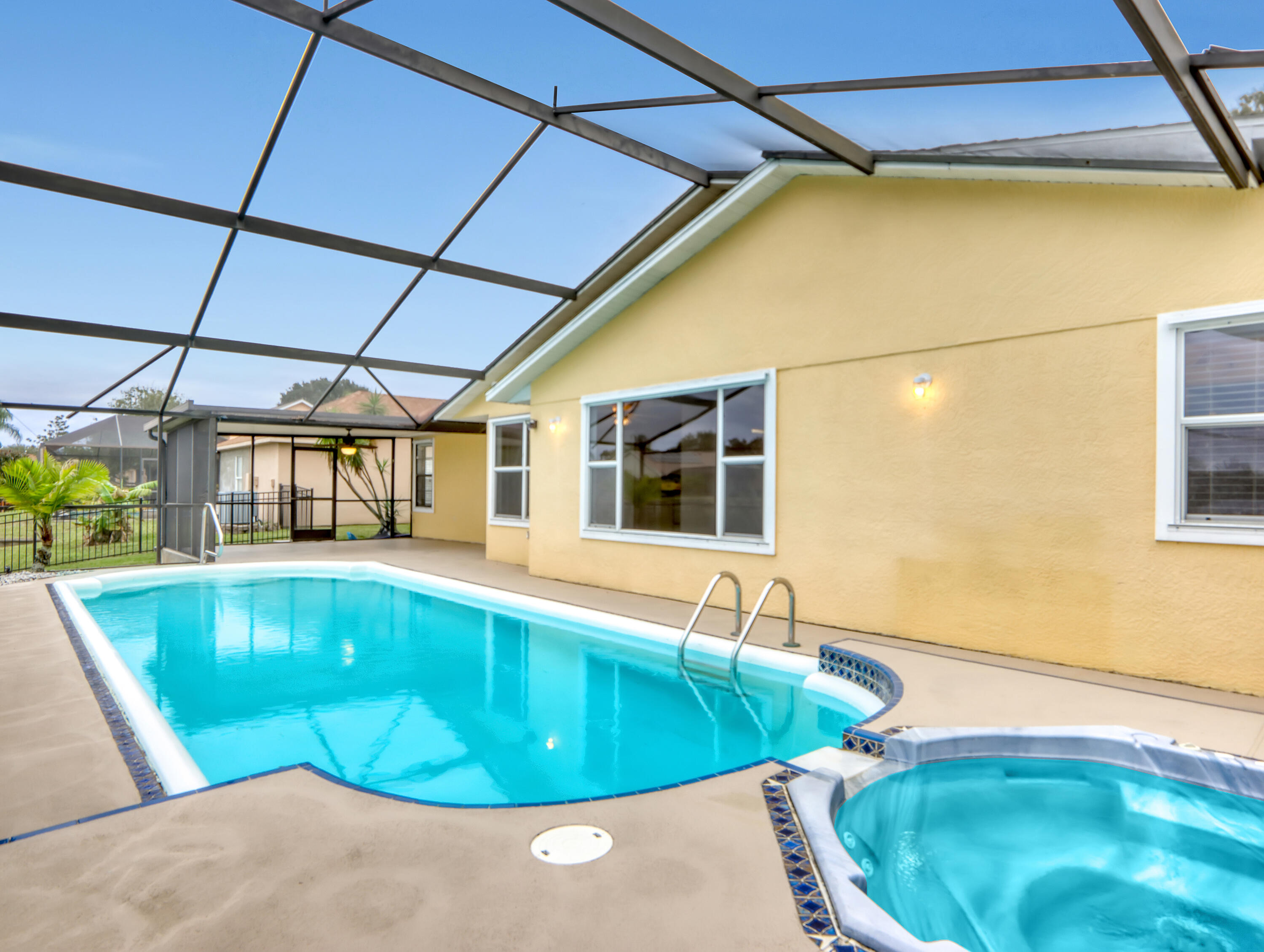 920 Turtle Pond Way Melbourne, FL 32940 - Photo 47 of 53 a view of a swimming pool with a patio