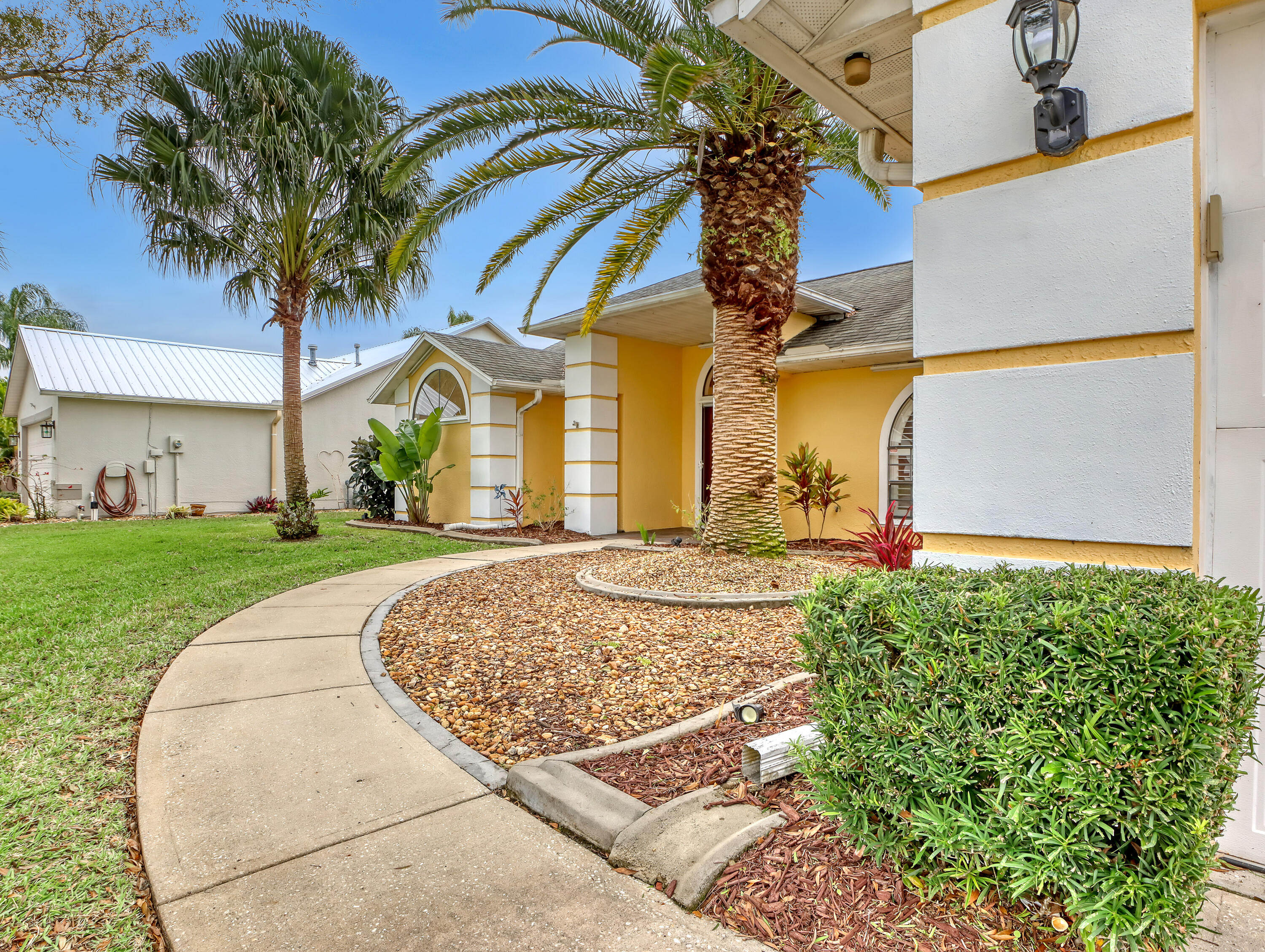 920 Turtle Pond Way Melbourne, FL 32940 - Photo 7 of 53 a view of a house with basketball court