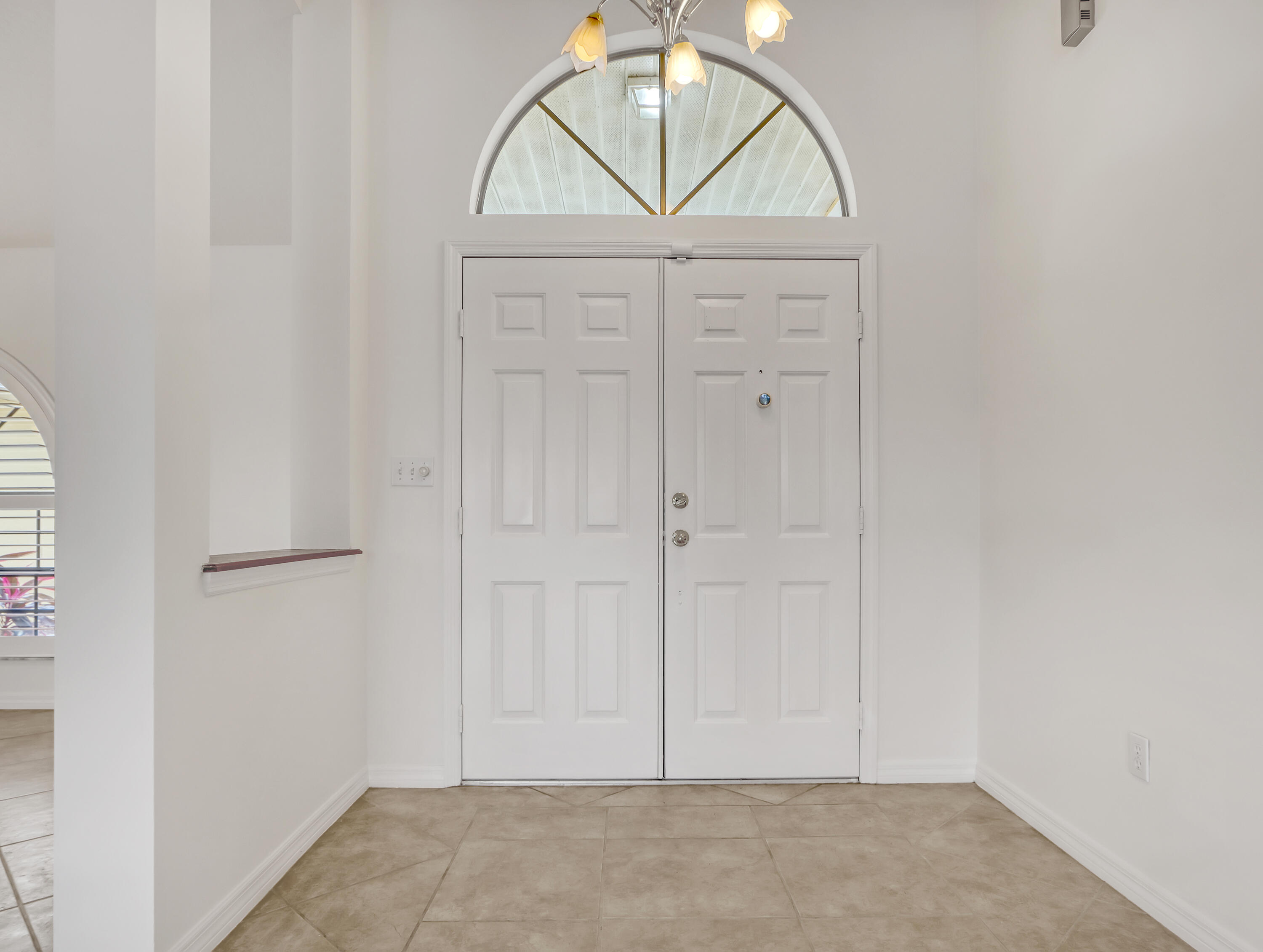 920 Turtle Pond Way Melbourne, FL 32940 - Photo 10 of 53 a view of front door with a mirror