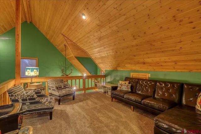 a view of an empty room and a window