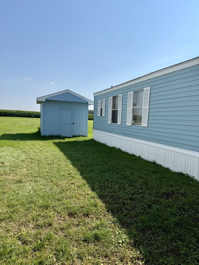 23 Walnut Street Minooka, IL 60447 - Photo 17 of 17 a house view with a garden space