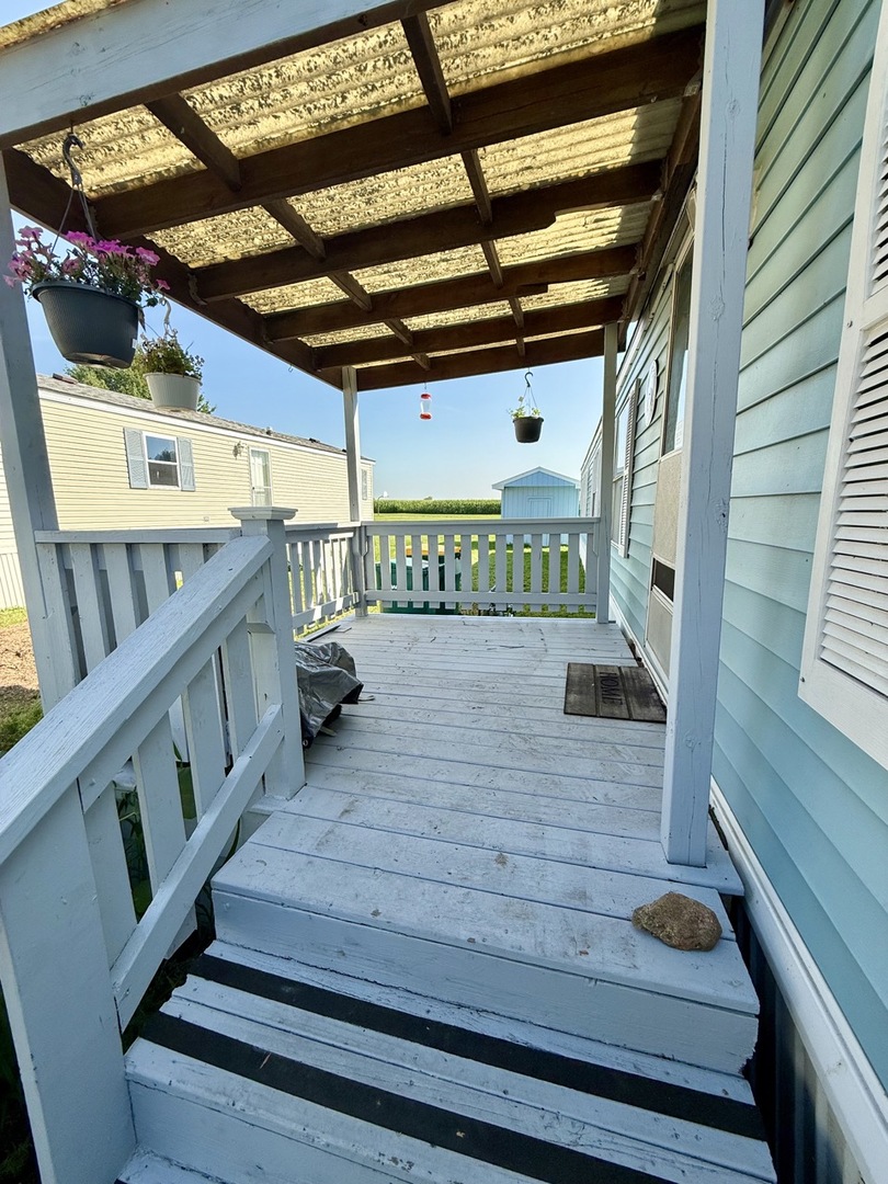 23 Walnut Street Minooka, IL 60447 - Photo 2 of 17 a view of stairs and a patio