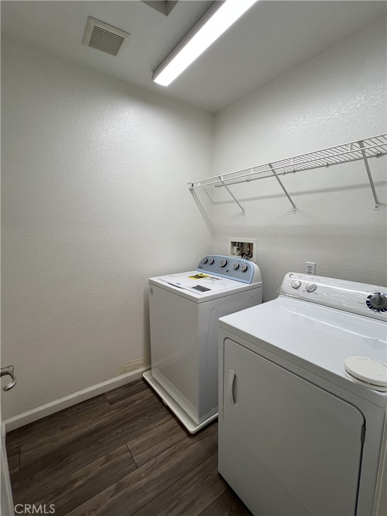 1779 Edmon Way Riverside, CA 92501 - Photo 6 of 10 a utility room with dryer and washer