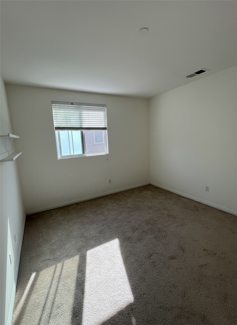 1779 Edmon Way Riverside, CA 92501 - Photo 7 of 10 an empty room with windows