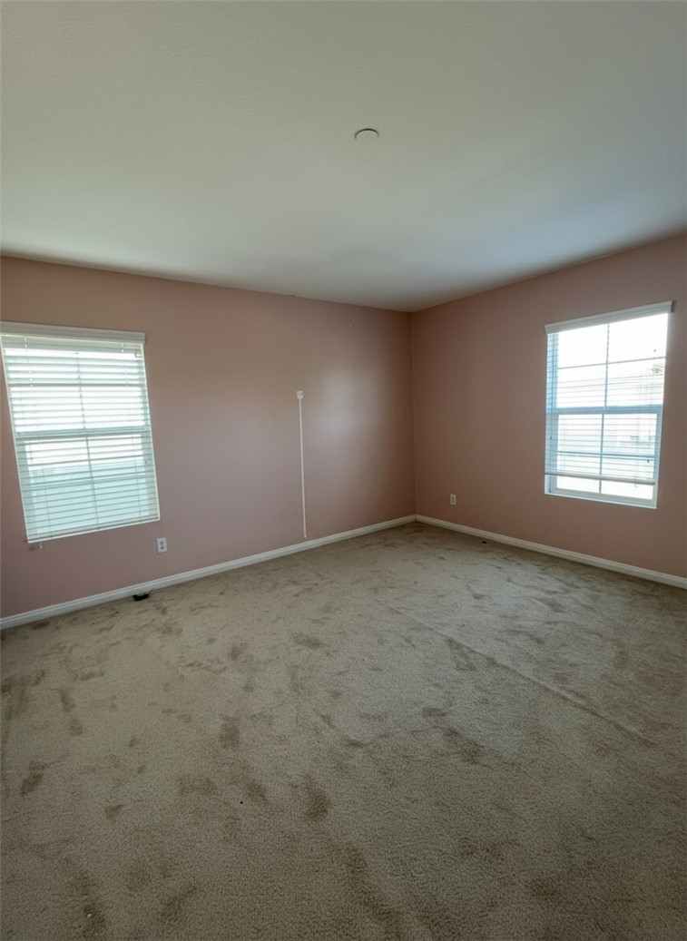 1779 Edmon Way Riverside, CA 92501 - Photo 8 of 10 an empty room with windows