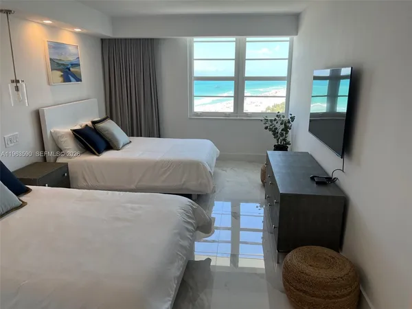 a room with gym equipment and a large window
