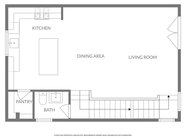 an aerial view of a house with a garden and plants