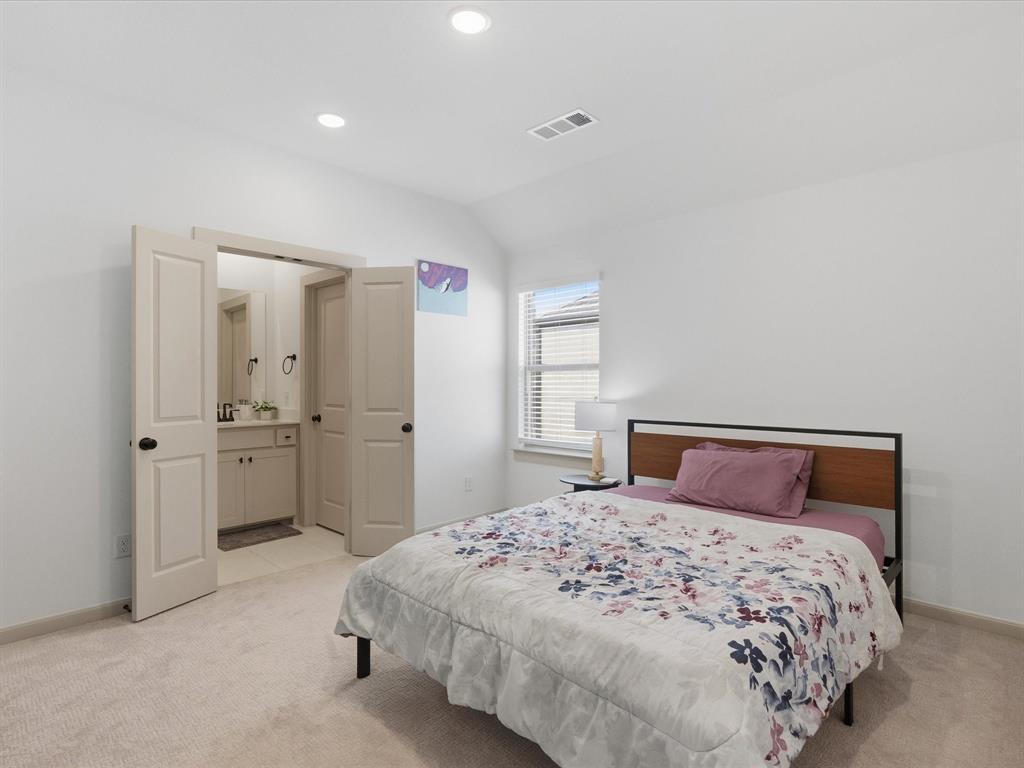 9533 Keep Street Frisco, TX 75035 - Photo 29 of 40 Bright bedroom featuring neutral carpeting, recessed lighting, and a window with blinds
