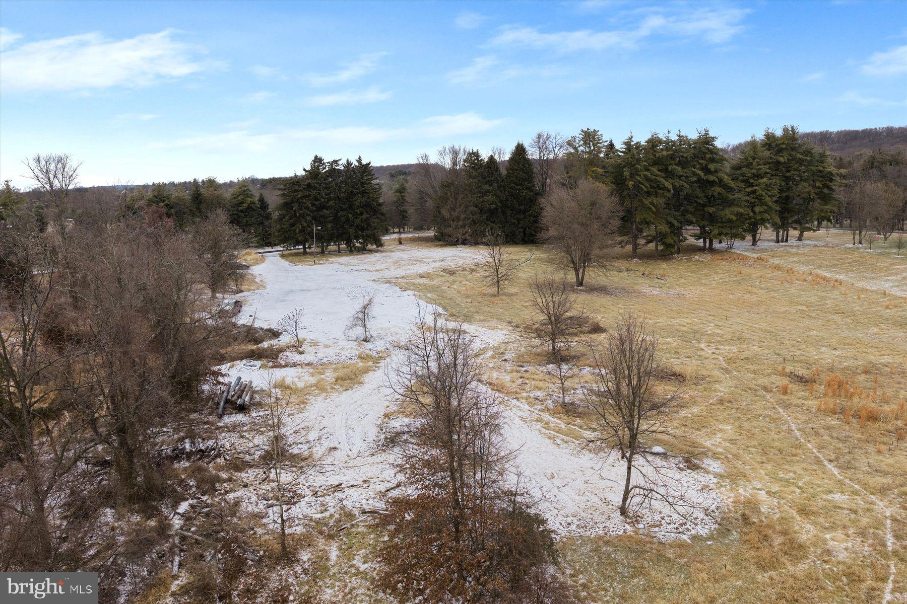 152 Thompson Mill Road Newtown, PA 18940 - Photo 7 of 17 a view of a dry yard with trees
