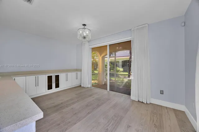 a view of livingroom with kitchen