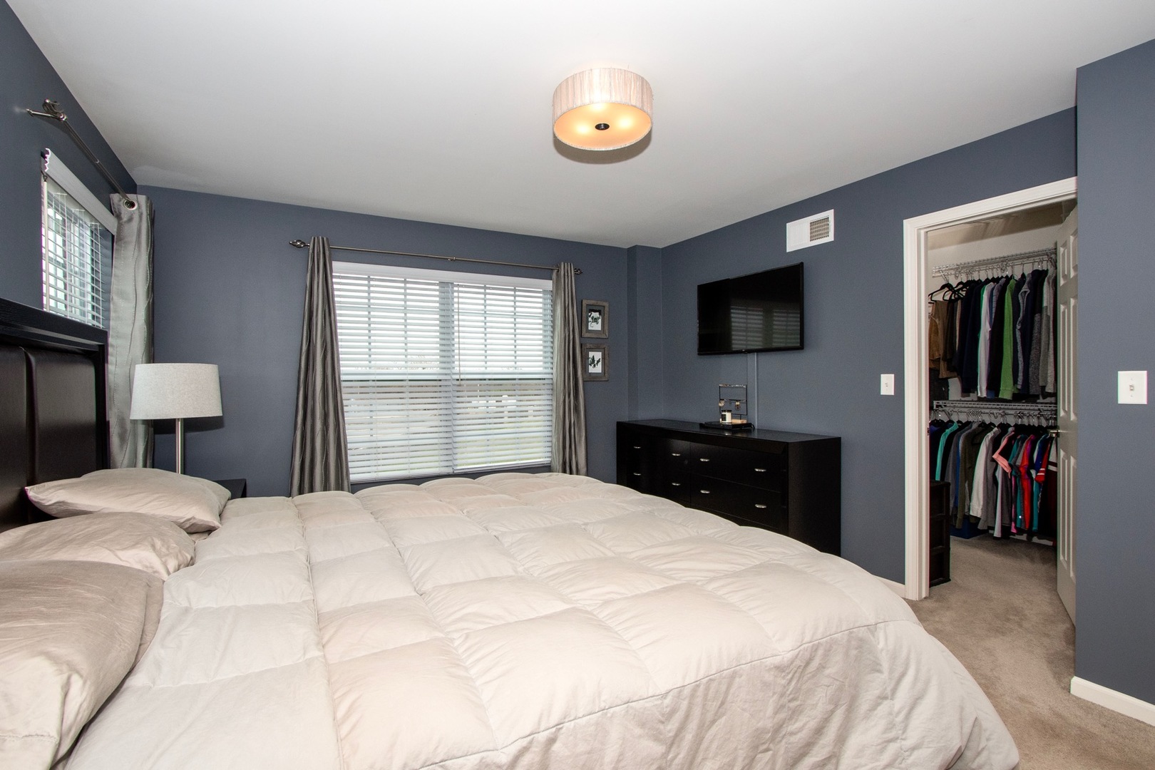 10346 Kerry Ridge Court Chicago Ridge, IL 60415 - Photo 11 of 20 a bedroom with a bed and a flat screen tv