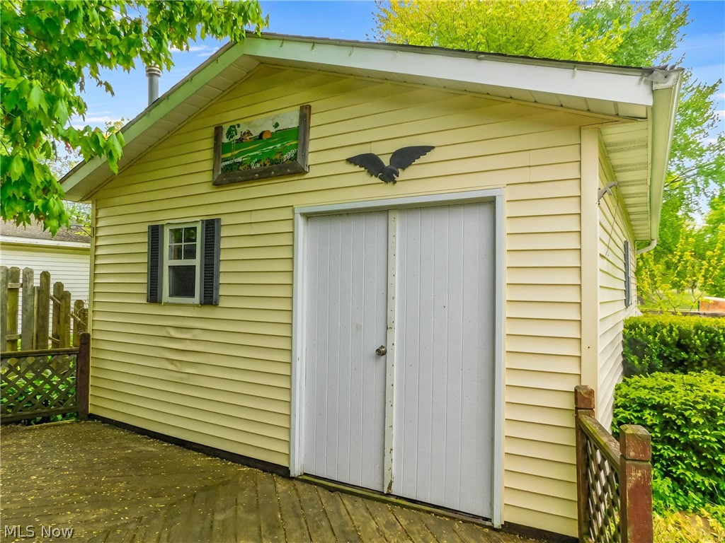 7386 Lake Road East Madison, OH 44057 - Photo 10 of 36 15x25 workshop entrance with new doors.