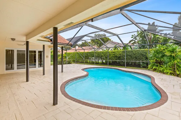 a view of a swimming pool with a porch