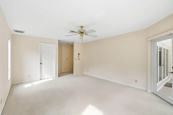 a view of a room with racks on the wall