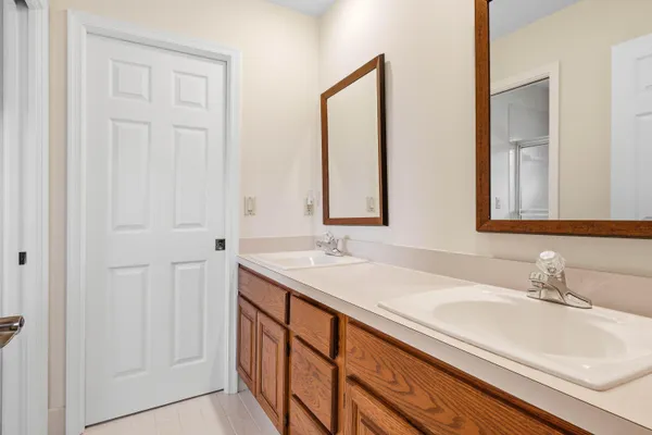 a bathroom with a shower and a toilet