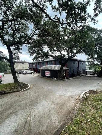 a car parked in front of a house