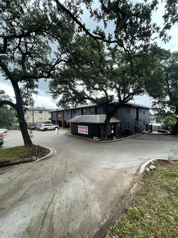 a car parked in front of a house