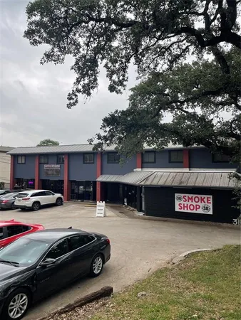 a car parked in front of a building