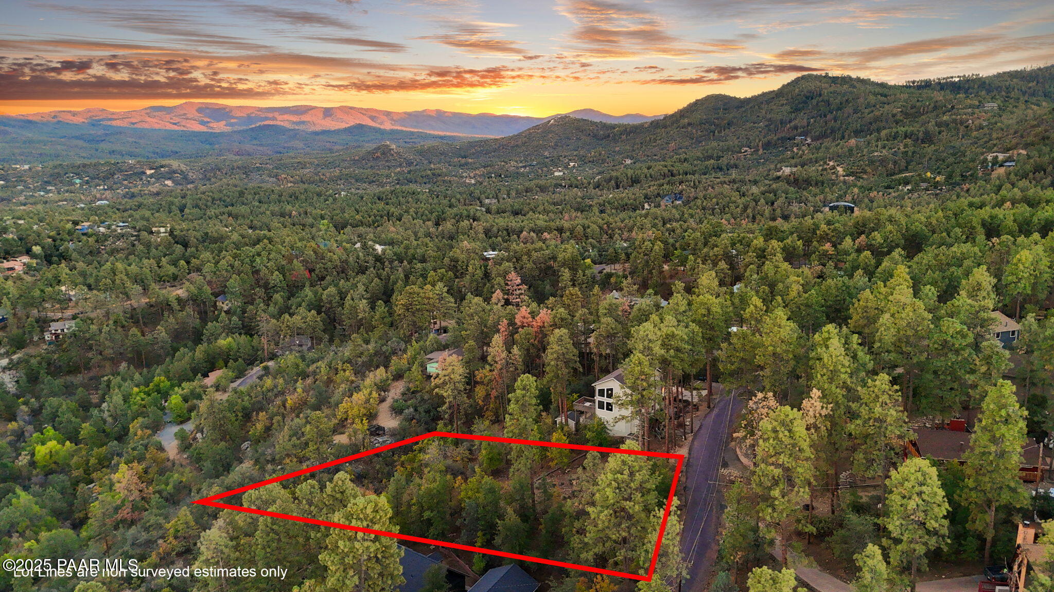 2370 West Mountain Laurel Road Prescott, AZ 86303 - Photo 8 of 12 a view of a lush green hillside and a houses