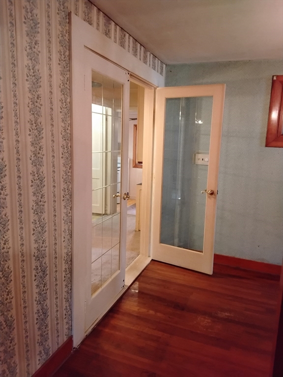419 Spring Street Hanson, MA 02341 - Photo 23 of 26 a view of a bathroom with wooden floor and glass door