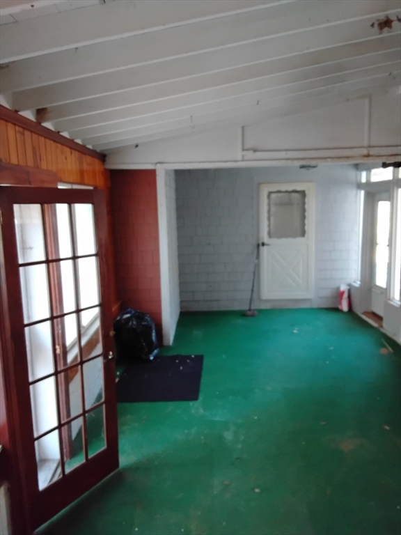 419 Spring Street Hanson, MA 02341 - Photo 5 of 26 a view of a room with windows and cabinet