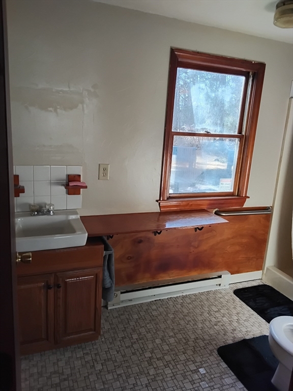 419 Spring Street Hanson, MA 02341 - Photo 7 of 26 a room with a window
