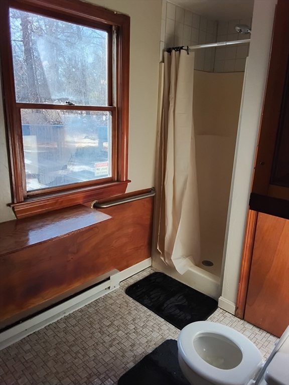 419 Spring Street Hanson, MA 02341 - Photo 8 of 26 a bathroom with a toilet and a shower