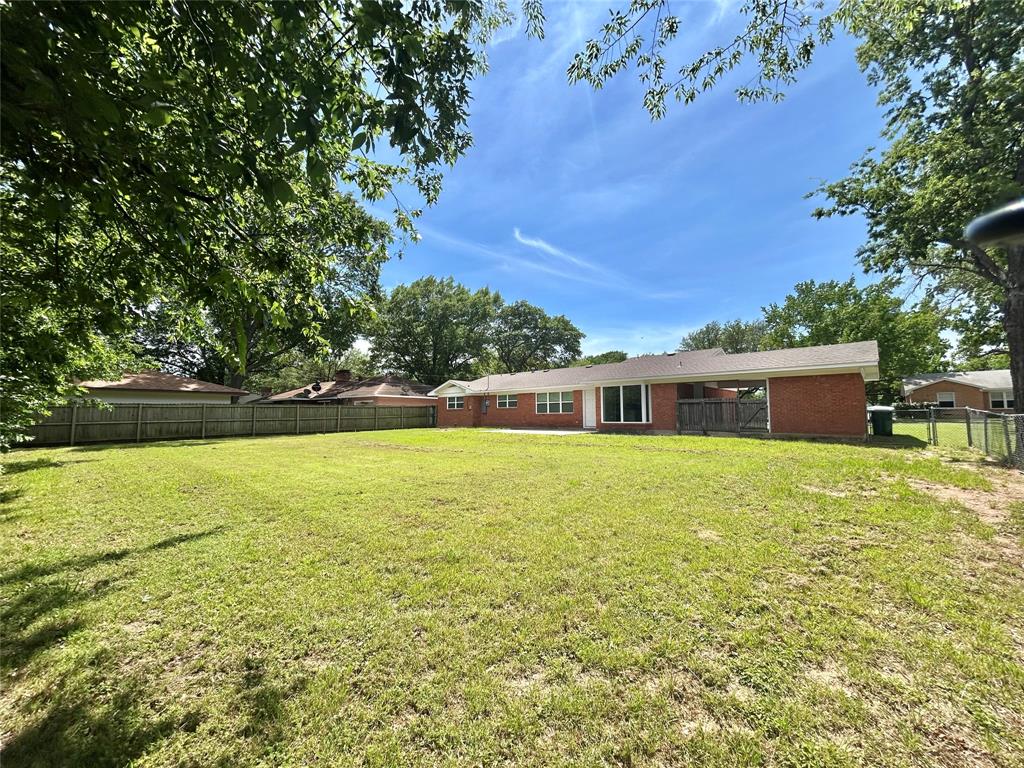 306 Line Drive Gainesville, TX 76240 - Photo 2 of 21 a view of outdoor space and yard