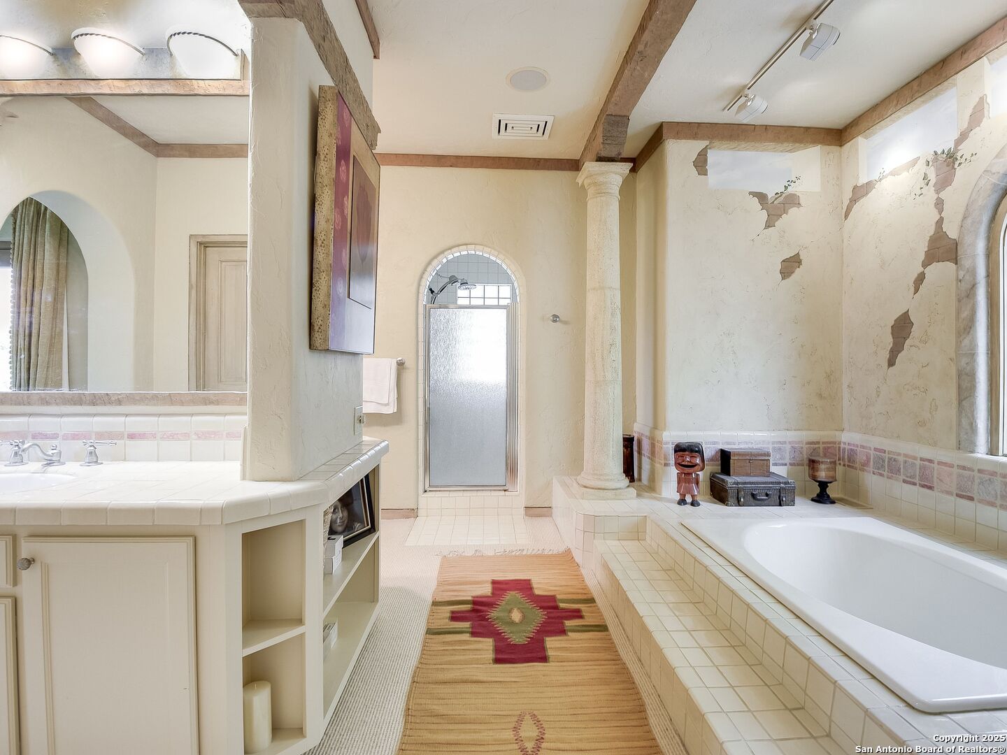 110 Axis Circle Boerne, TX 78006 - Photo 16 of 29 a bathroom with a bathtub and a shower