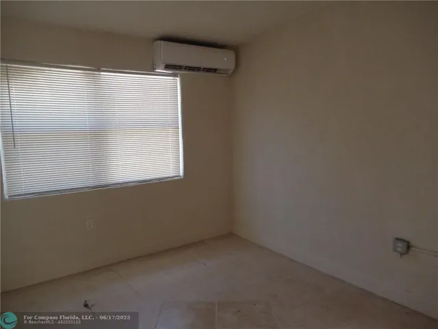 an empty room with a window