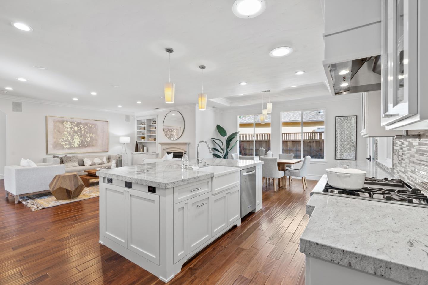 1161 Morton Court Mountain View, CA 94040 - Photo 12 of 33 a large white kitchen with stainless steel appliances
