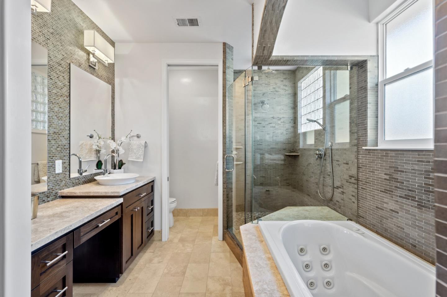 1161 Morton Court Mountain View, CA 94040 - Photo 18 of 33 a bathroom with a tub sink shower and mirror