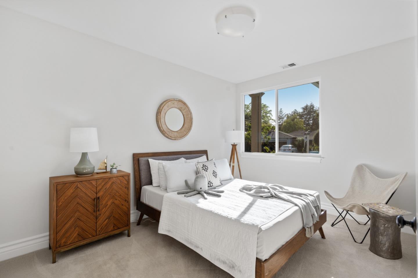 1161 Morton Court Mountain View, CA 94040 - Photo 20 of 33 a bedroom with a bed and a window