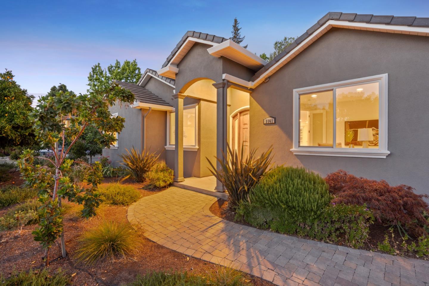 1161 Morton Court Mountain View, CA 94040 - Photo 2 of 33 a front view of a house with a yard