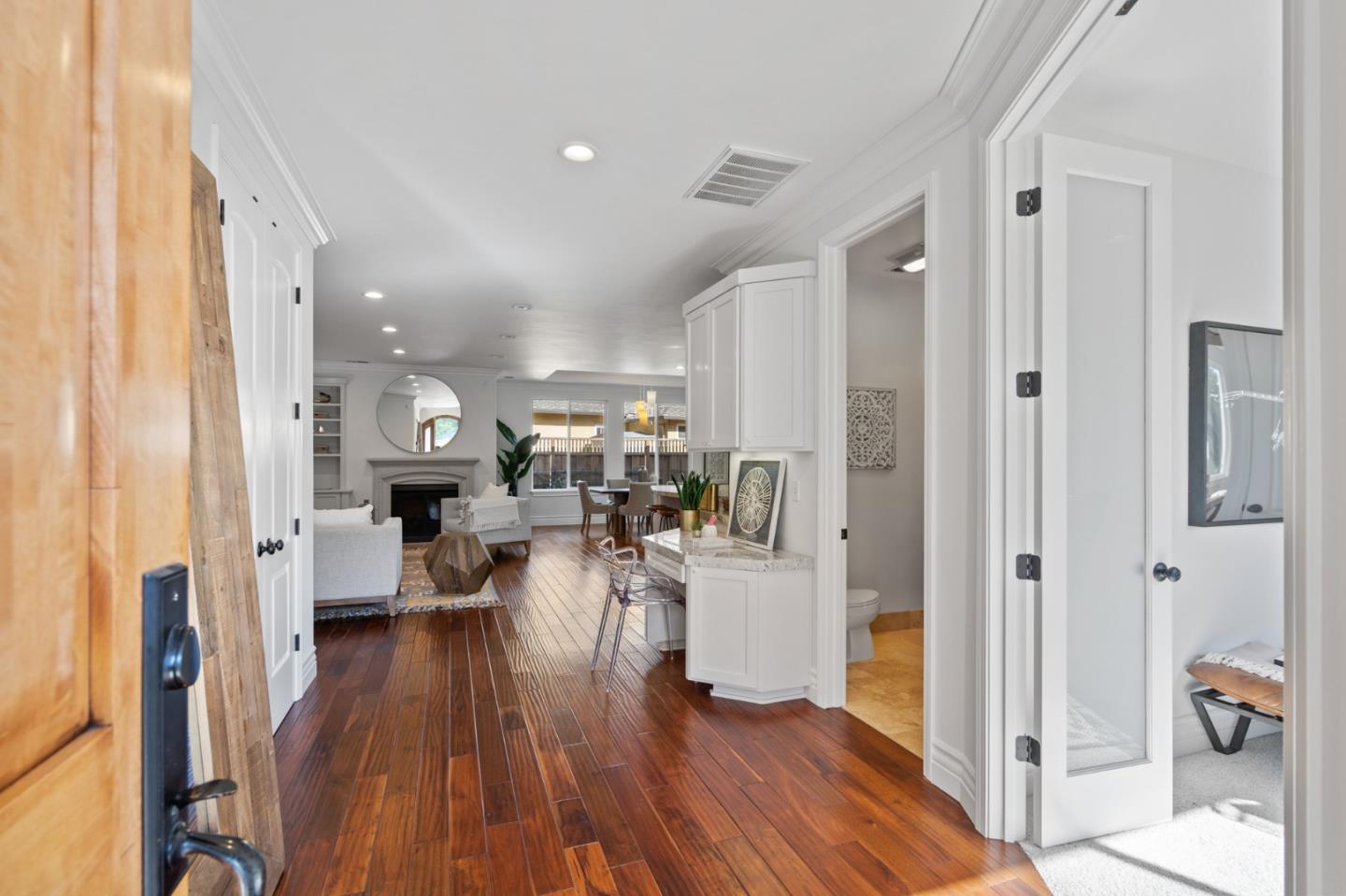1161 Morton Court Mountain View, CA 94040 - Photo 3 of 33 a living room with furniture a wooden floor and a large window