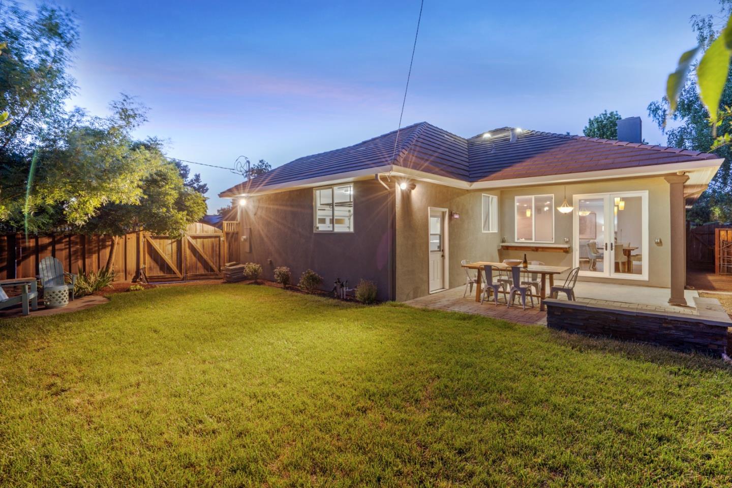 1161 Morton Court Mountain View, CA 94040 - Photo 31 of 33 a backyard of a house with table and chairs