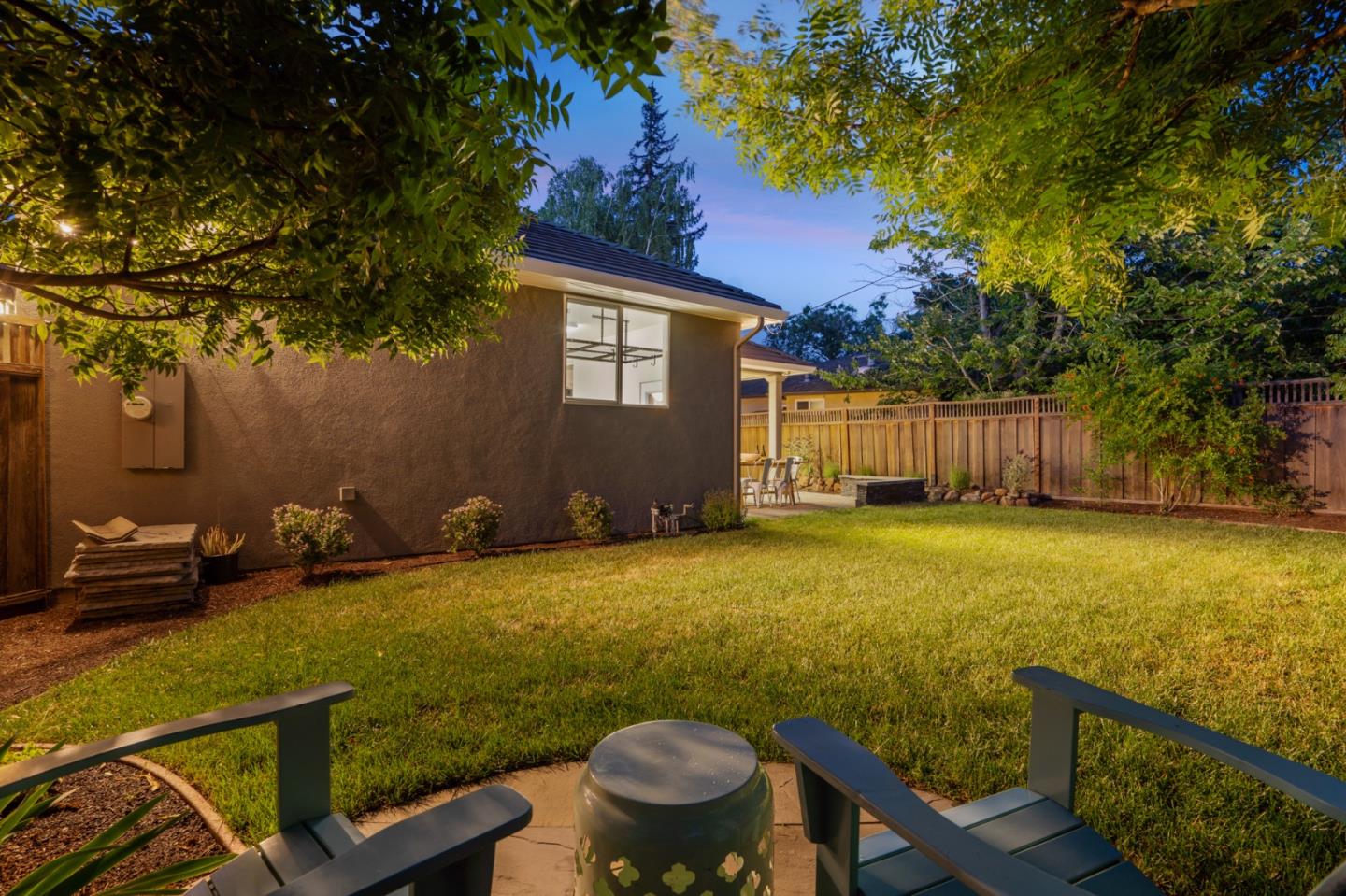 1161 Morton Court Mountain View, CA 94040 - Photo 32 of 33 a view of a backyard with table and chairs a barbeque and wooden fence