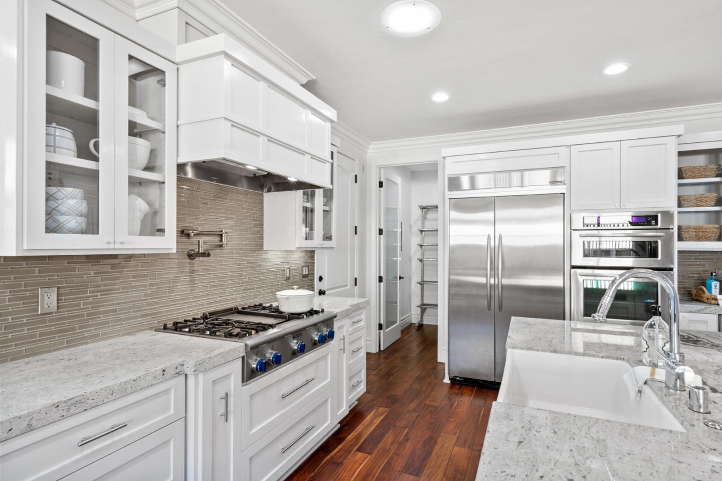1161 Morton Court Mountain View, CA 94040 - Photo 10 of 33 a kitchen with stainless steel appliances granite countertop a stove a refrigerator and a sink