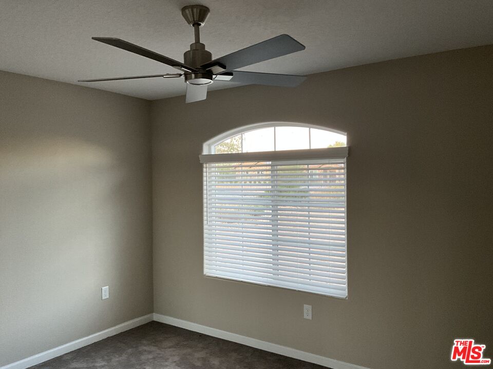 13033 Casco Road Apple Valley, CA 92308 - Photo 12 of 14 en empty room with a window