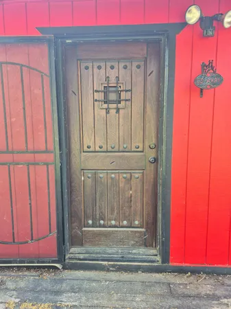 a view of a door with a red door